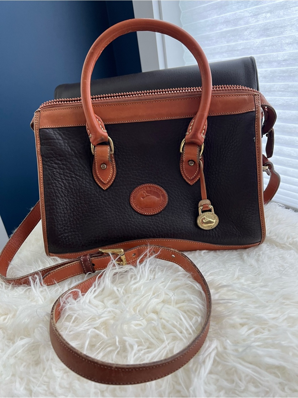 Dooney & Bourke VINTAGE black pebbled Leather satchel with British tan trim.